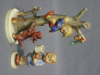 A Goebel figure of a boy climbing a tree being pursued by a dog (branch f) 6"