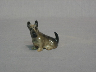 A Royal Doulton figure of a seated Scottish Terrier, base marked K18 2"