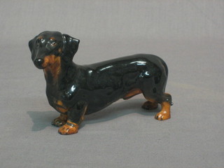 A Royal Doulton figure of a Dachshund, base marked H1129 D 5"