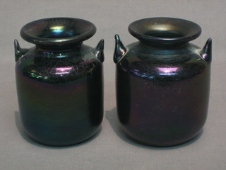 A pair of Victorian plum coloured twin handled glass vases 4"