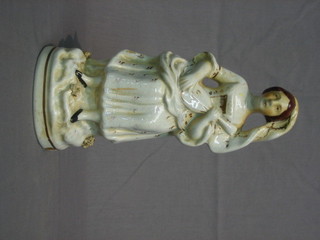 A 19th Century Staffordshire figure of a standing lady with mandolin 10"
