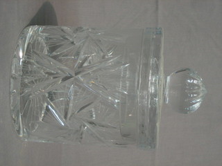A cylindrical cut glass biscuit barrel and cover 7"