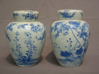 A pair of 19th Century blue and white Oriental ginger jars and covers 9", 1 with original inner lid