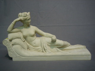 A resin sculpture of a reclining lady after G Rossi, reverse marked 974 20"