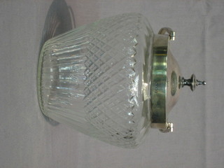 A cut glass biscuit barrel with silver plated mounts