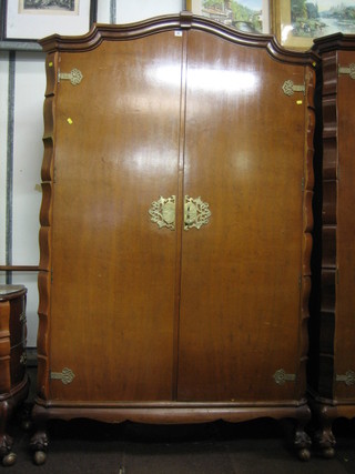 Ensuite with lot 75 - a gentleman's 1930's Queen Anne style walnut double wardrobe, raised on cabriole supports 48"