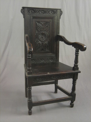 A Victorian carved oak Wainscot chair
