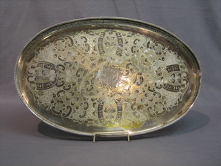 A modern oval silver plated tea tray with pierced gallery 22"