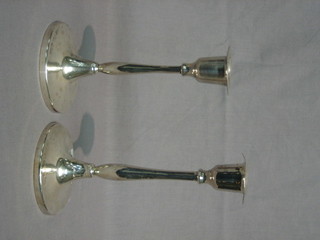 A pair of South African silver plated candlesticks 7"