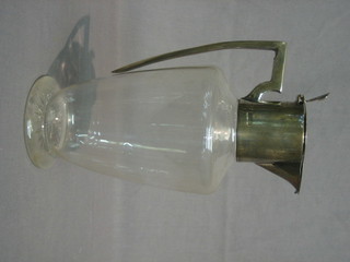 An Edwardian glass claret jug with silver mounts (marks rubbed)