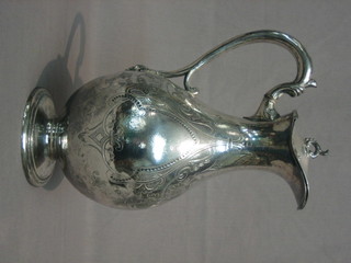 An engraved Britannia metal hotwater jug