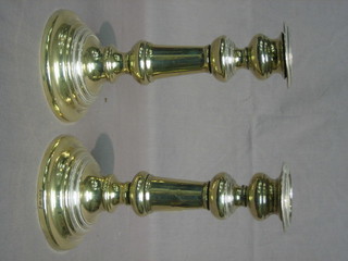A pair of circular silver plated candlesticks 8" (1 sconce f)
