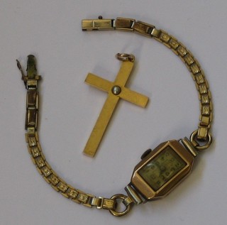A 9ct gold cross set a pearl and a lady's gold cased wristwatch