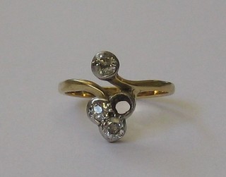 A lady's 18ct gold dress ring set 3 diamonds (1 missing)