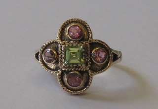 A lady's 9ct gold dress ring set peridots and amethysts