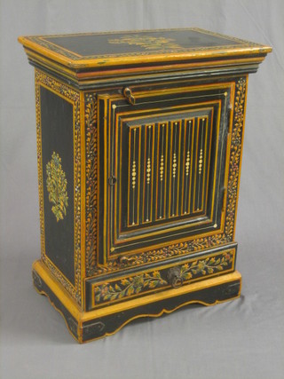 An Eastern painted hardwood cabinet enclosed by panelled door, the base fitted a drawer 22"