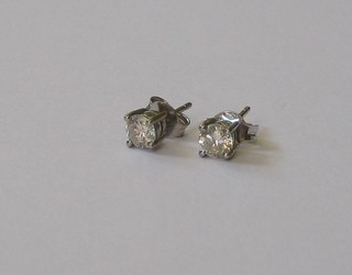 A pair of diamond stud earrings (approx 0.76ct)