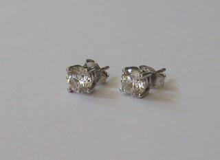 A pair of claw set diamond stud earrings (approx 1.75ct)