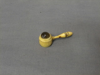 A miniature ivory magnifying glass in the form of a gavel 2"