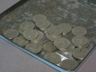 A George V 1921 shilling and various Elizabeth II shillings