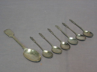 A silver fiddle pattern pudding spoon and 6 silver apostle  spoons 4 ozs