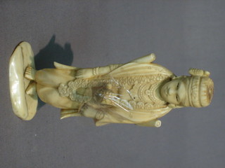 A 19th Century carved ivory figure of a standing lady 5"