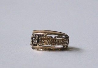 A pierced gold dress ring with Grecian Key decoration