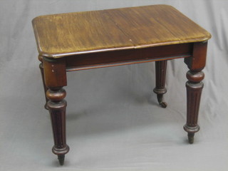 A small Victorian rectangular mahogany extending dining  table, raised on turned and fluted supports 35"