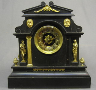 A  Victorian  8  day  striking mantel  clock  with  brass  dial  and Arabic  numerals  contained in a black slate case with  gilt  metal mounts