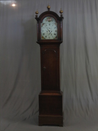An  18th Century 8 day longcase clock with 12" arch shaped  dial painted  flowers and with Roman numerals, minute indicator  and calendar  dial by Jonathon Chanter?, strikes on a bell, contained  in an oak case 85"