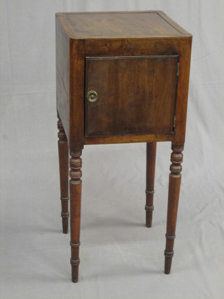 A   Georgian   mahogany  bedside  cupboard  raised   on   turned supports 14"