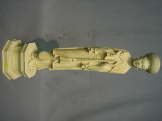 A resin figure of a standing Eastern Deity 21"