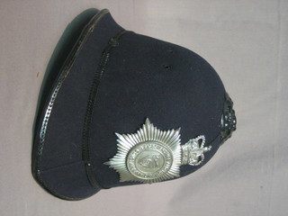 A  Policeman's   helmet   with   Queens   Crown   helmet   plate Lincolnshire and Rutland Constabulary