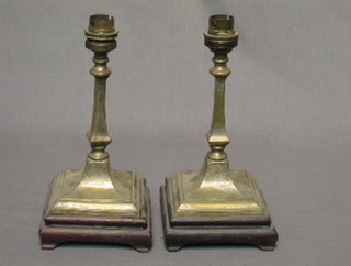 A pair of metal table lamps in the form of candlesticks 10"