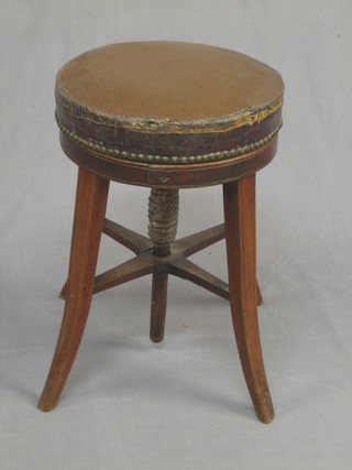 An early 19th Century mahogany piano stool
