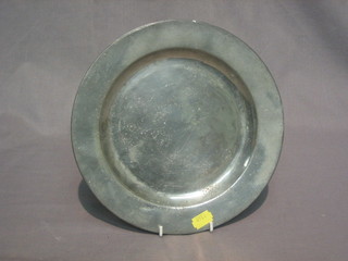 A  pair  of 18th Century pewter dishes by  William  Phillips,  the reverse with Touch mark and W Corvell 9 1/2" (polished)
