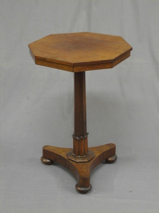 A  William IV octagonal mahogany occasional table, raised on  a chamfered column with triform base 18"