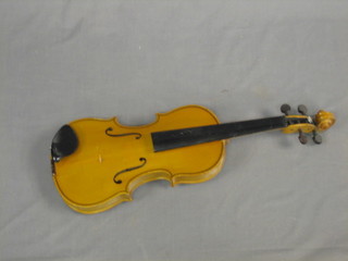 A violin with 2 piece back 12" (no strings)