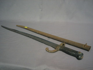 A  French Chassepot bayonet dated 1871 complete with  scabbard