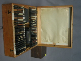 A  pine  box containing a collection of wooden slides 12"  x  10" and 1 other pine box 11" x 5" containing slides
