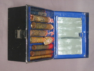 A  19th/20th  Century  metal  theatrical  makeup  box  containing contents 5 1/2"