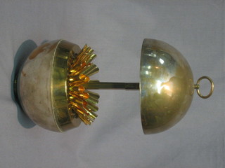 A 1930's metal orb shaped cigarette box with hinged lid