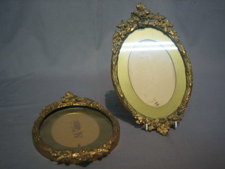 A pair of 19th/20th Century oval gilt plaster frames  10"