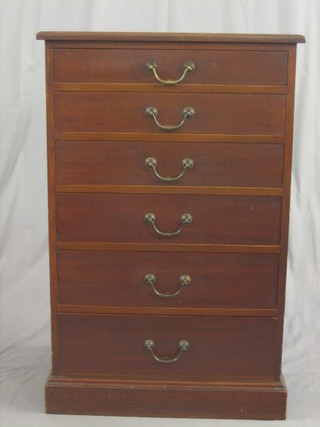 An  Edwardian mahogany pedestal chest of 6 long  drawers  with brass  swan  neck  drop  handles raised on  a  platform  base  27"