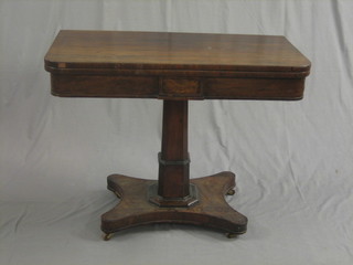  A William  IV rosewood D shaped card table, raised on  a  square column with triform base 36"