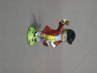 A Staffordshire Toby jug in the form of a Town crier 3"