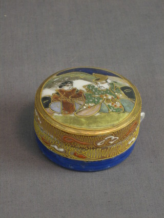A  circular  Japanese porcelain painted trinket box  and  cover  2"