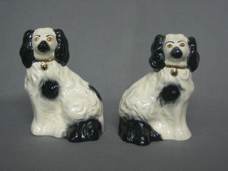 A pair of Beswick figures of black and white seated Spaniels,  the base marked Beswick 1378 - 6 5"