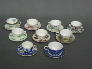 A  collection  of  10  various 20th  Century  miniature  cups  and  saucers