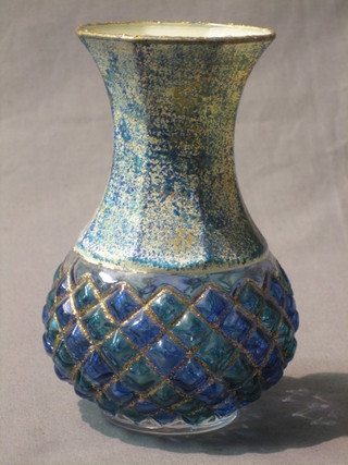 A pineapple shaped green blue glass vase 6"